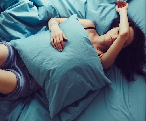 This is a picture of a women suffering with a migraine. For migraine sufferers, chiropractic care for migraine relief becomes a viable option.